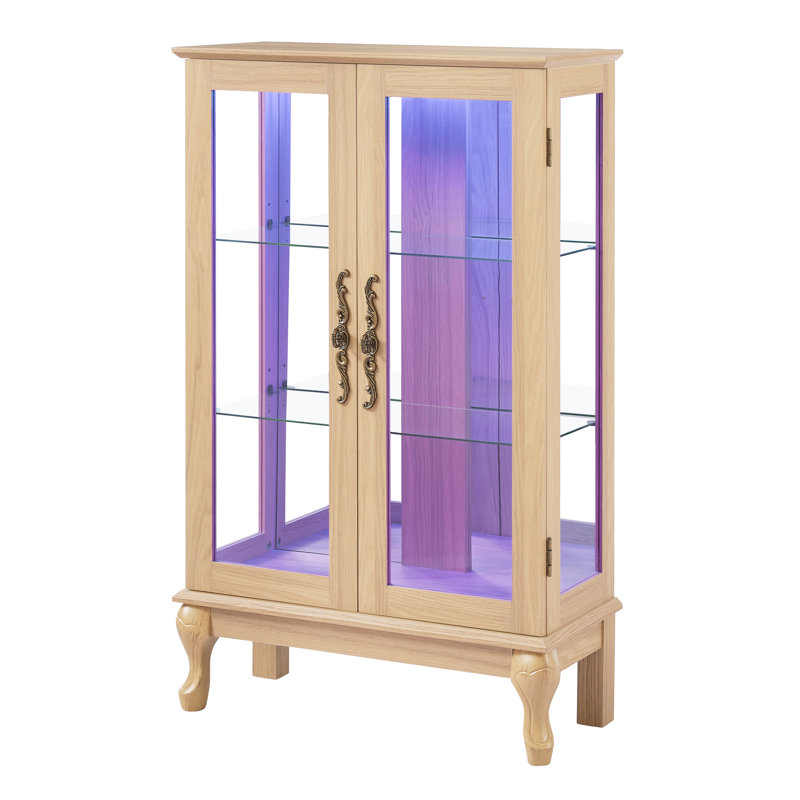 Élégante petite vitrine avec éclairage intégré, dossier et structure en miroir pour objets de collection.