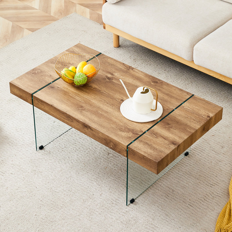 Table basse avec pieds en verre trempé
