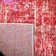 Tapis rouge à motif abstrait Riebe