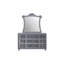 Commode élégante à 9 tiroirs avec plateau en verre trempé, façades capitonnées en velours et poignées en faux cristal pour les chambres glamour