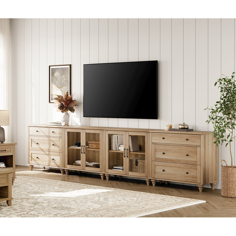 Scarlett 135.4" W Solid and Manufactured Wood TV Stand with Glass Doors and Solid Wood Legs , Oak