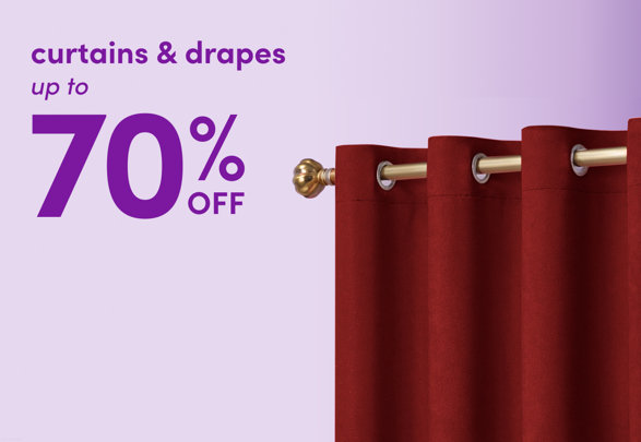 Curtains and drapes up to 70 percent off featuring red grommet-top curtains on a gold rod.