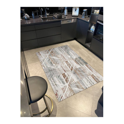 Tapis crème lavable à la machine à motif géométrique crème