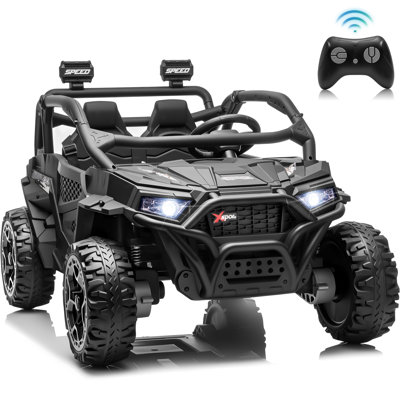 Véhicule tout-terrain électrique (UTV) noir 24 V pour enfants avec télécommande parentale, suspension à quatre roues, musique Bluetooth et lumières LED.