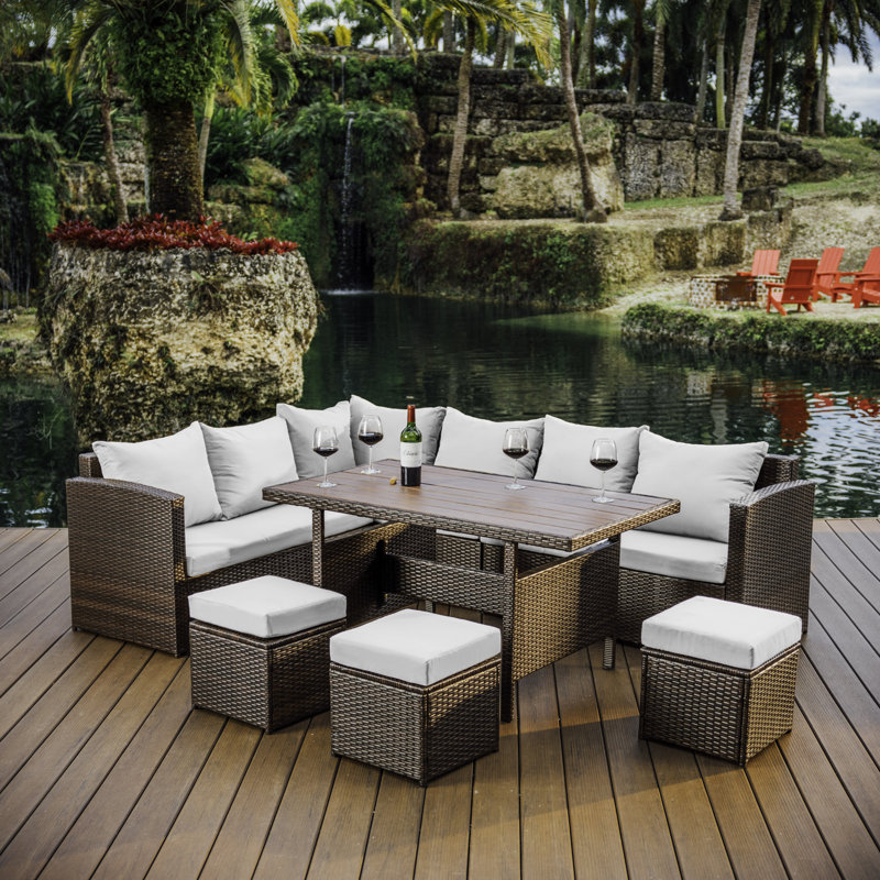 Brown Wicker 7-Piece Outdoor Dining Set with Off-White Cushions
