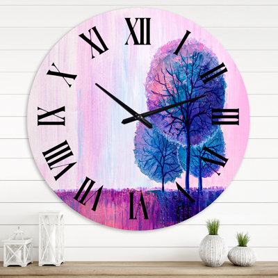 Arbres colorés et joyeux au lever du soleil - horloge murale