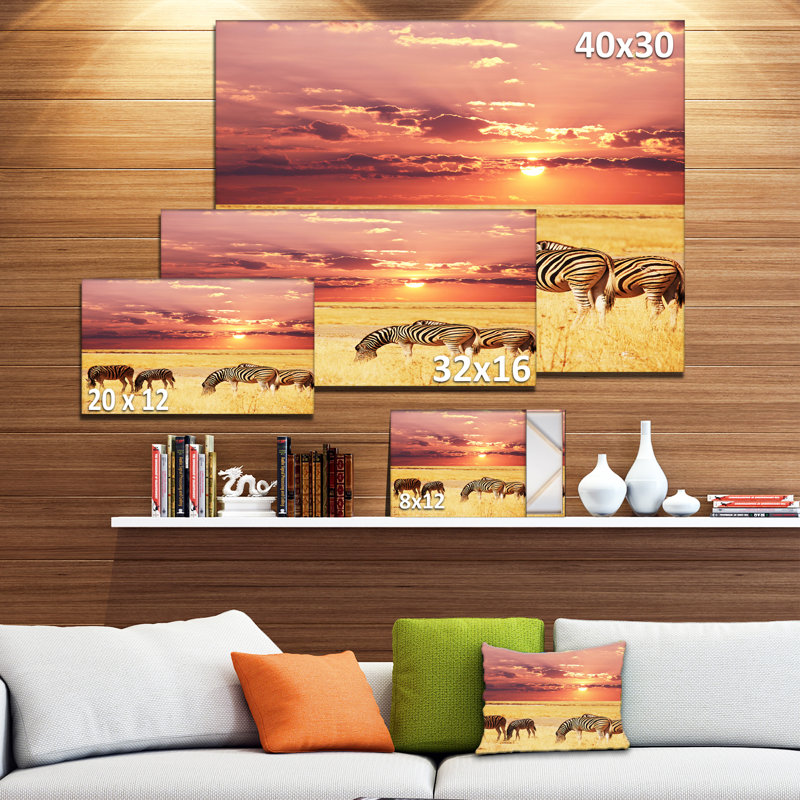 Zebras Grazing Together at Sunset Canvas Landscape Print