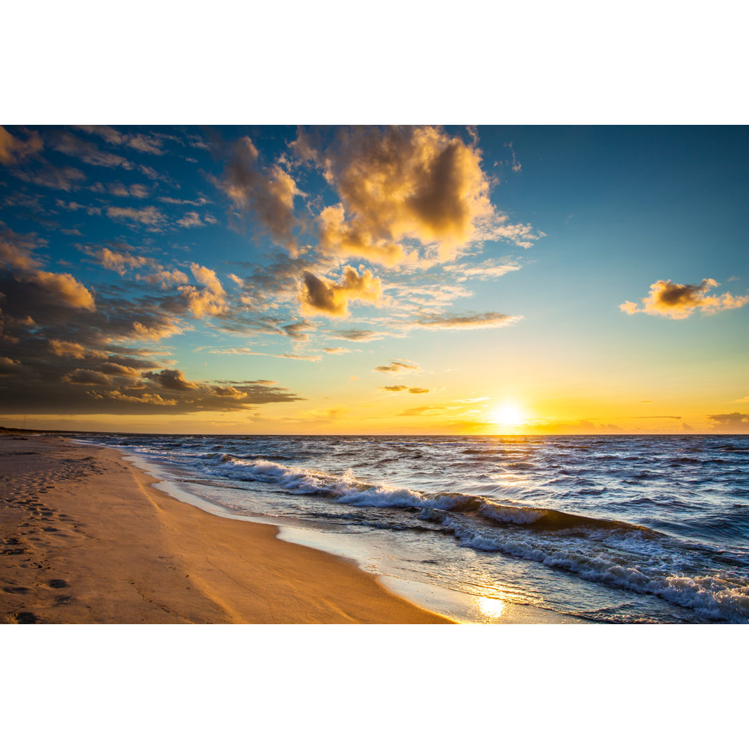 Sonnenuntergang über dem Strand und dem Meer - Leinwandbild