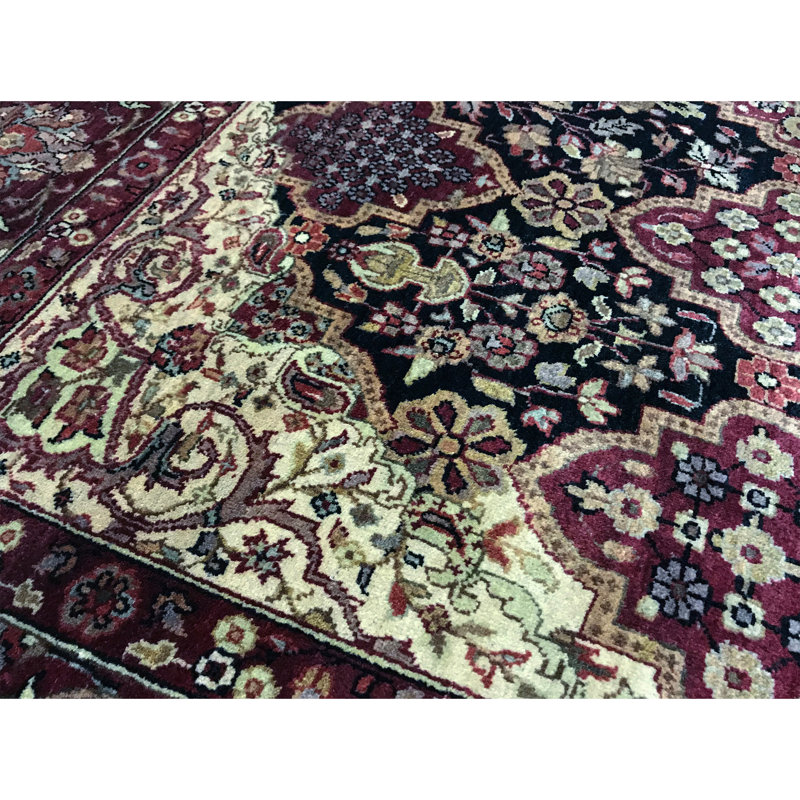 Lamani Wool Oriental Area Rug in Black/Red/Beige/Green