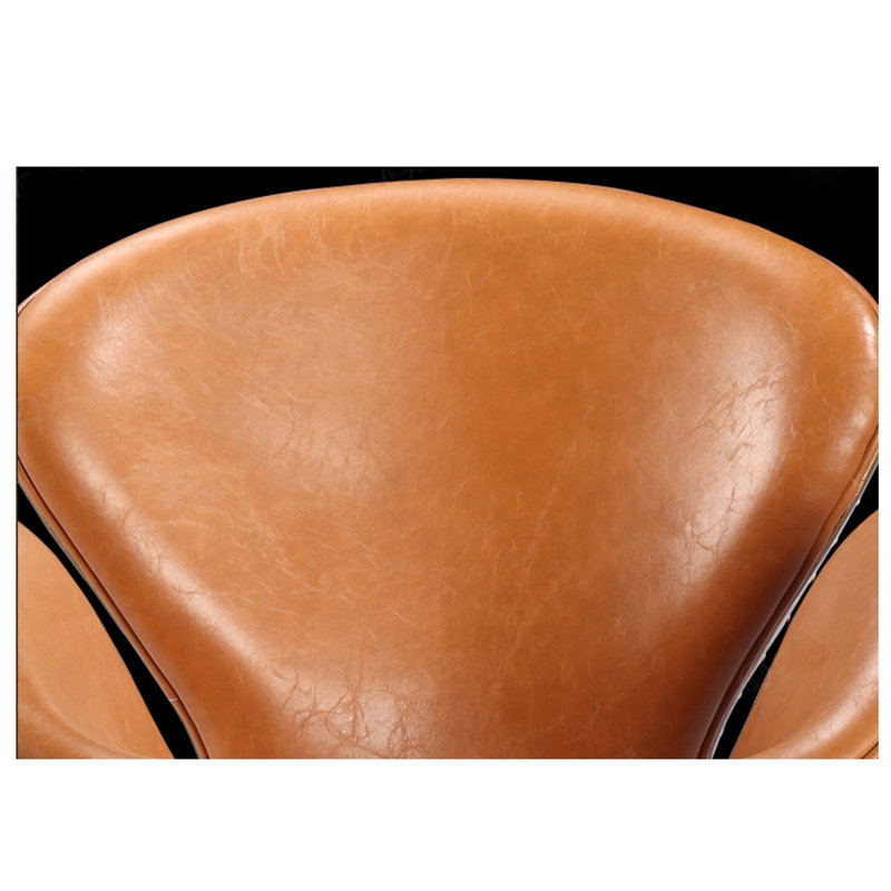 Rupini Faux Leather Swivel Wingback Chair