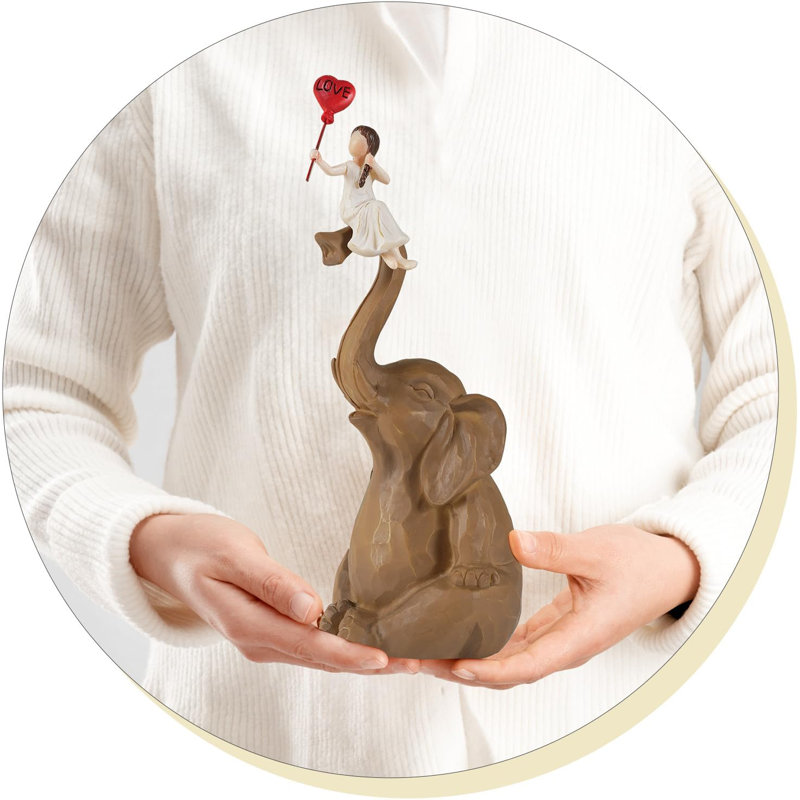 Figurine éléphant et fille, main, cœur, brun