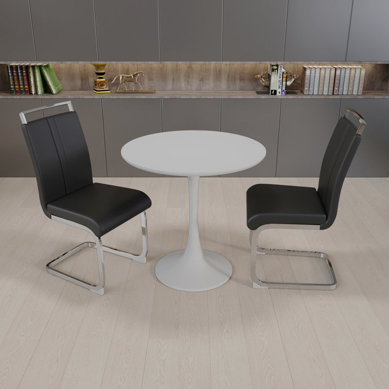 Ensemble de table de salle à manger 31,5 "en noyer circulaire, table à manger tulipe, table de salle à manger pour 2 à 4 personnes et 2 chaises de salle à manger en métal noir