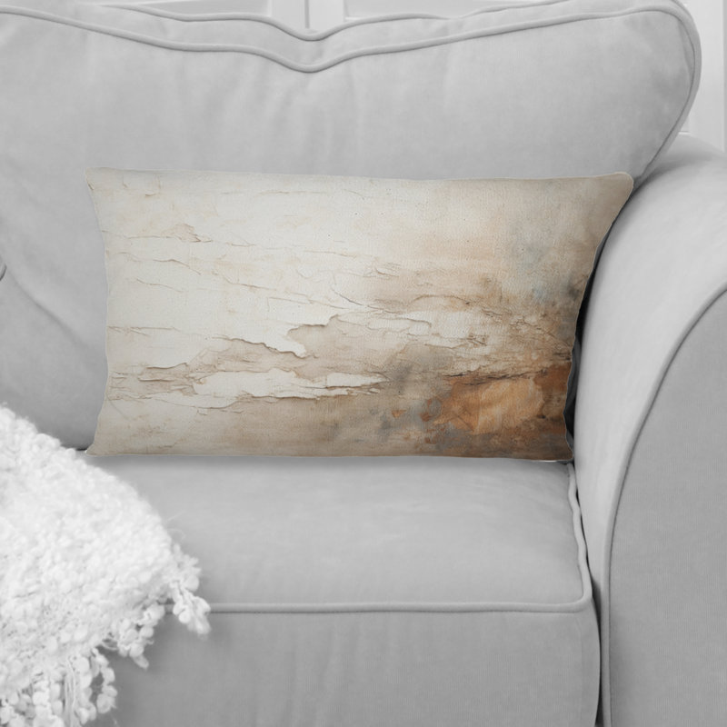 Coussin décoratif beige et brun avec peinture abstraite