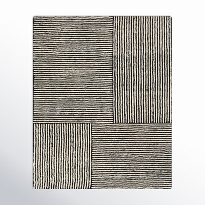 Balos Hand Tufted Black/Ivory Rug