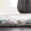 Tapis bleu rouille / ivoire Evangelyn-956104515
