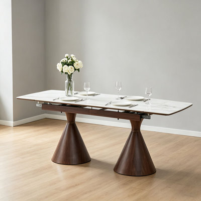 Extendable Stone-Top Dining Table: White marble-patterned tabletop with tapered metal legs. A modern, luxury-inspired rectangular dining table for hom