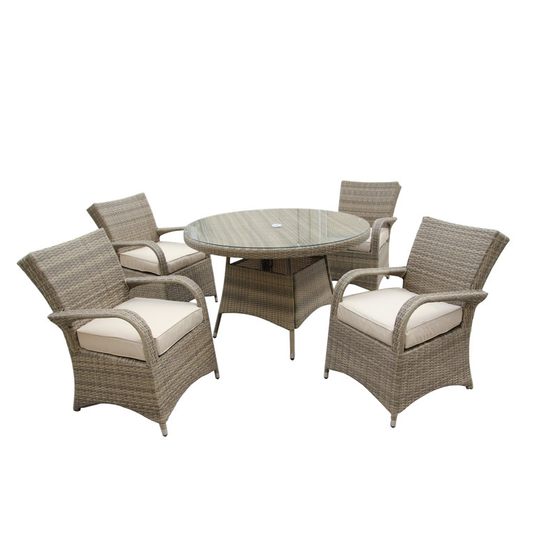 Judesa 4 - Person Wicker Patio Dining Set with Round Table , Cushions Included, Nature, Nature