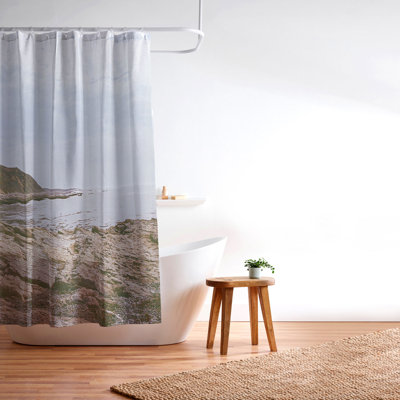 DENY Designs rocky beachside Shower Curtain