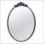 Miroir de conception classique avec forme ronde et cadre d'inspiration baroque pour salle de bain