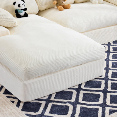 White corduroy compressed sofa. It has a soft and skin-friendly sitting feel, adding a healing atmosphere to the warm living room. It comes with 3 back cushions and 2 throw pillows.