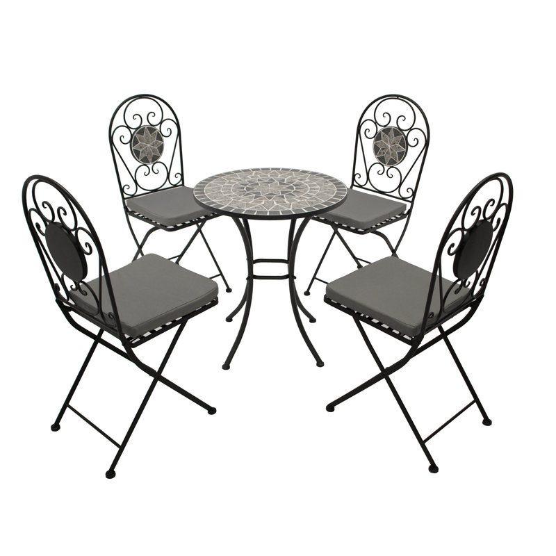 Stacy 4 - Person Patio Dining Set with Round Table , Cushions Included