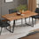 Table de salle à manger en acacia massif Delta de 72 po de style industriel avec rebord