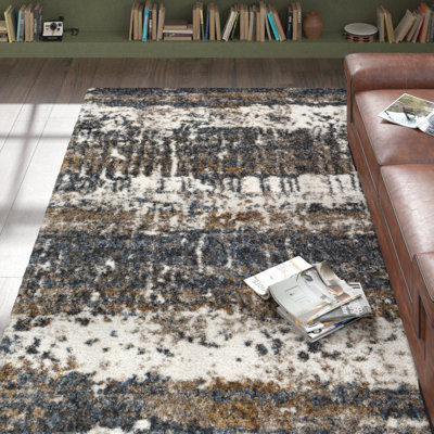 Maestas Machine Woven Abstract Shag Area Rug in Navy/Brown