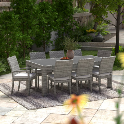 Fionnula 8-Person Rectangular Patio Dining Set with Sunbrella Cushions