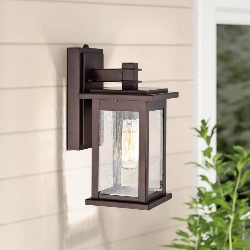 Ledbetter 12.25" H Seeded Glass Outdoor Wall Lantern with Dusk to Dawn, Oil Rubbed Bronze