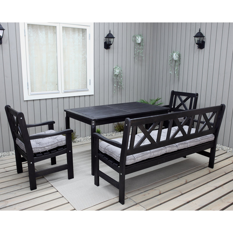 Destry 5 - Person Wood Patio Dining Set with Rectangular Table , Cushions Included, Black