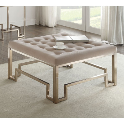 Cullompt Trestle Square Coffee Table in Beige and Champagne