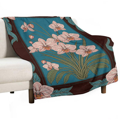 Plaid en flanelle de luxe à motif d'orchidées, doux et chaud, idéal pour le salon, le canapé ou le lit. Décoration intérieure.