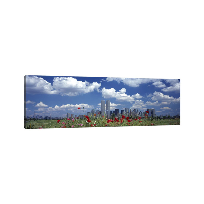 Flowers In A Park With Buildings In The Background, Manhattan, New York City, New York State, USA by Panoramic Images - Wrapped Canvas Panoramic Print