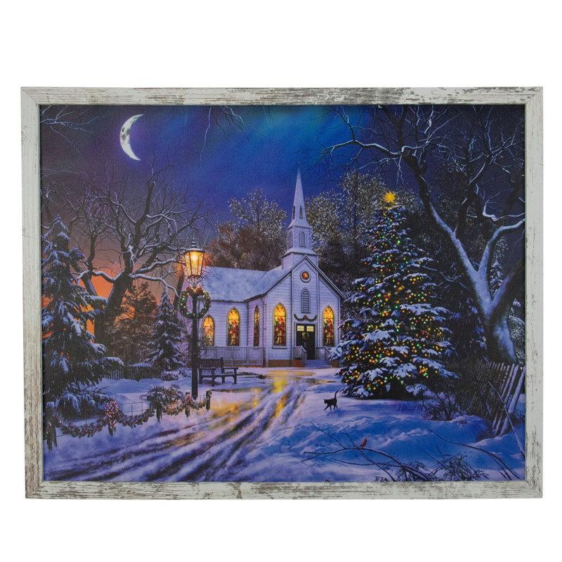 Église illuminée la nuit encadrée