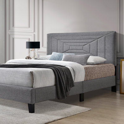 Lit plateforme tapissier touffeté