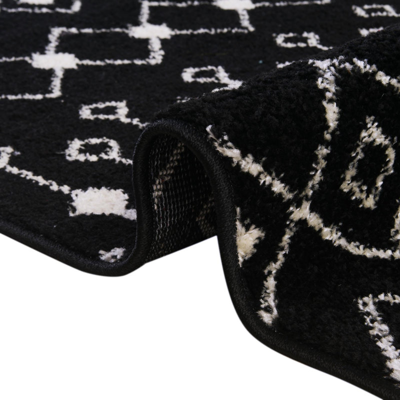 Tapis noir / blanc en polypropylène tissé à la machine Briehn, Ovale 4 pi x 6 pi