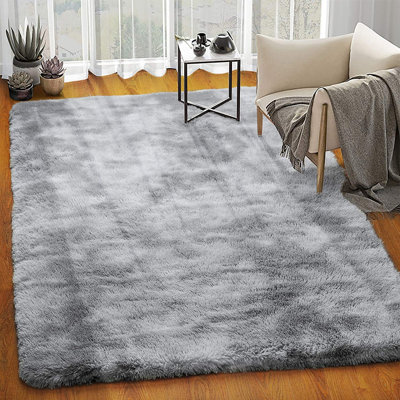Tapis rayé à poils longs gris
