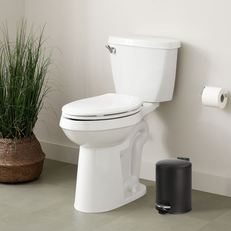 Compact Black Cylindrical Step-On Trash Can with Inner Bucket
