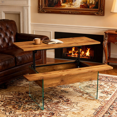 La table basse de 43,3 pouces avec fonction de réglage de la hauteur (avec espace de rangement) combine style rustique et verre trempé. Conception peu encombrante, plusieurs options de couleurs, convient au salon et au bureau