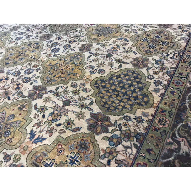 Lamani Wool Oriental Area Rug in Ivory/Blue/Green