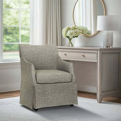Fauteuil rembourré à jupe avec roulettes cachées