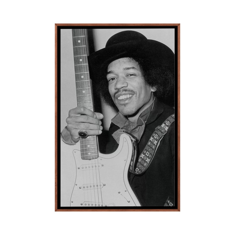 A Smiling Jimi Hendrix Holding His Guitar by Radio Days - Print on Canvas, Classic Brown Wood Framed, 101.6 cm H x 66.04 cm W