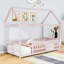 Charmant lit simple en bois en forme de maison avec garde-corps