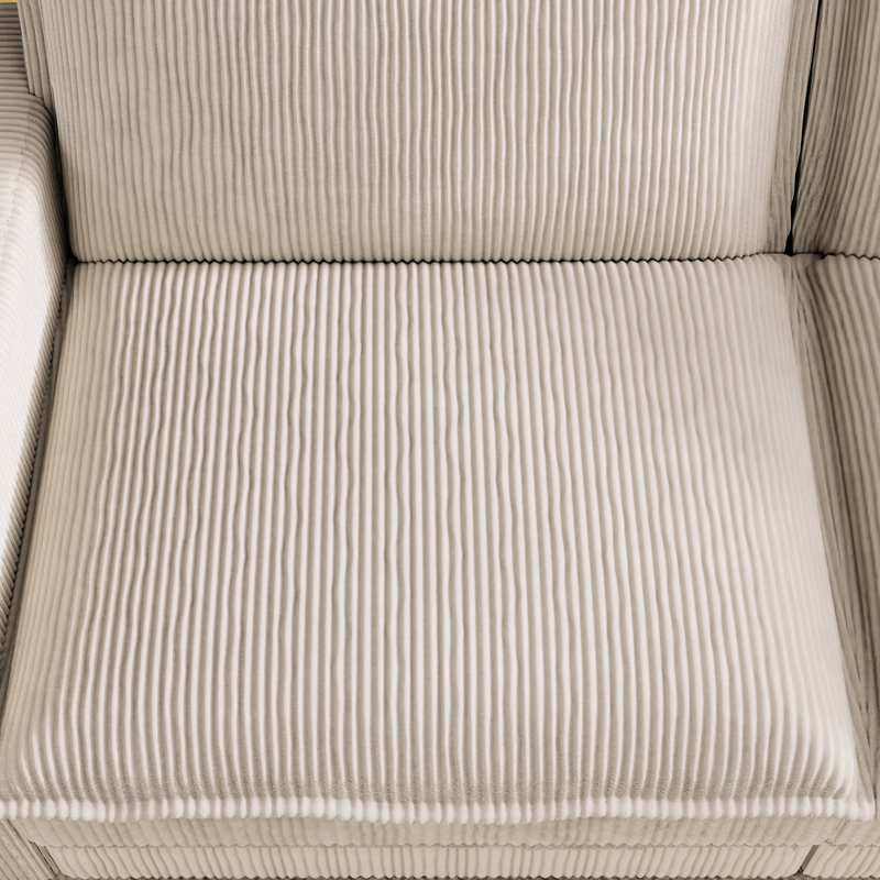 Salon moderne beige avec assise confortable et profonde en tissu haut de gamme
