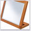 Miroir de maquillage réglable en polyrésine de 8 pouces avec finition noyer, parfait pour le toilettage de précision et le décor élégant d'un meuble-lavabo.