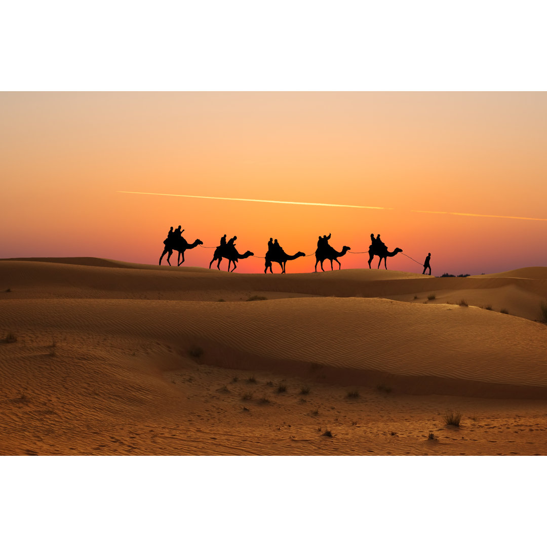 Camels Caravan With People On Desert At Sunset - Wrapped Canvas Print