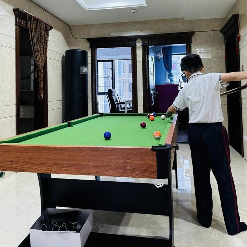 A Versatile Dual-Function Table that Serves as Both a Billiards Table and a Dining Table.
