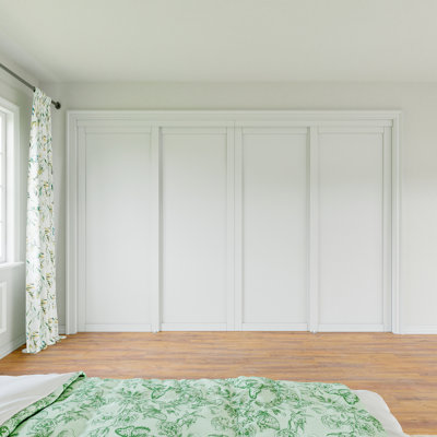 Paneled White Primed Solid Core Manufactured Wood Sliding Closet Door With Hardware
