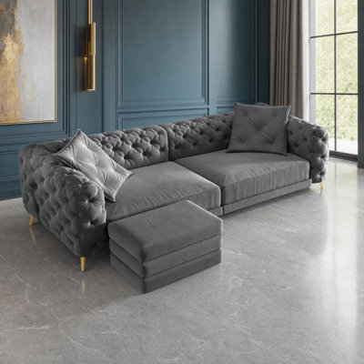Canapé-lit gigogne en velours capitonné avec pouf assorti