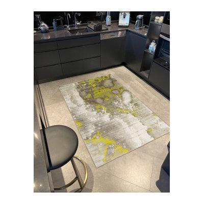 Tapis jaune lavable à rayures rayées